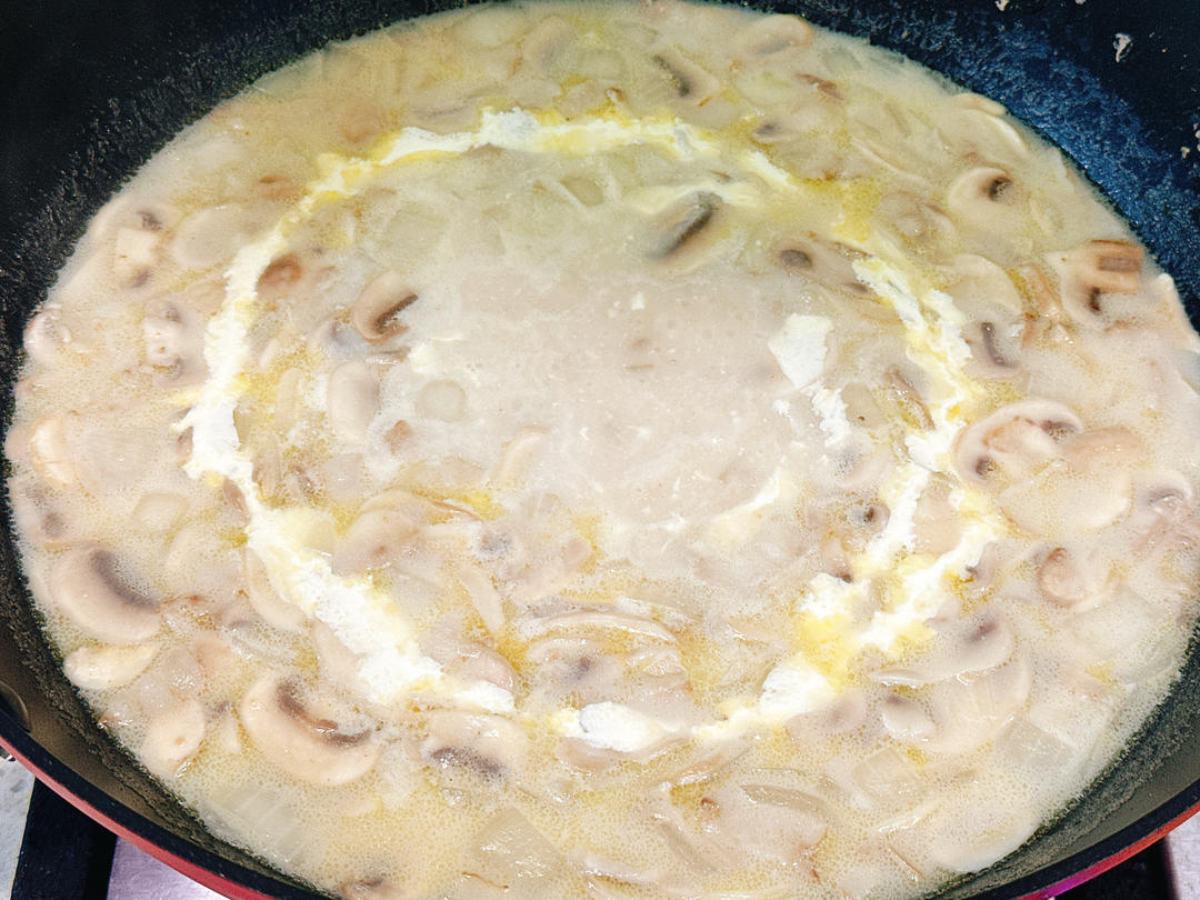 Pour in the cream and milk and stir to combin