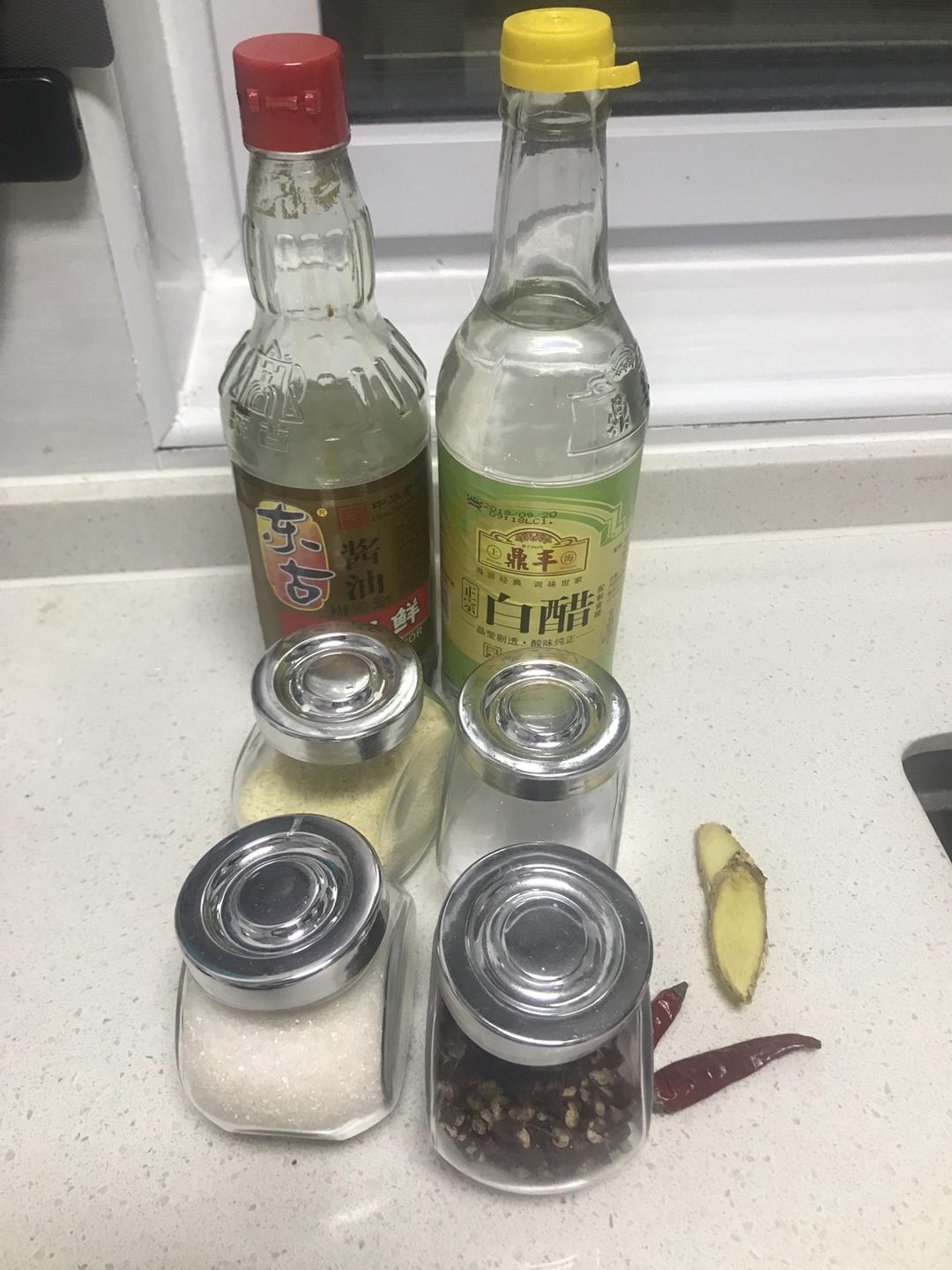 Add the soy, vinegar, sugar, chilies, and peppercorns