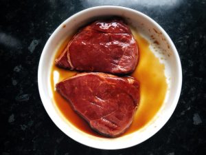 Dry the steak, rub it, and marinate at least half an hour