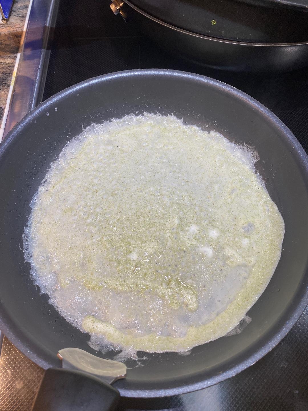 Pour in enough batter to cover the bottom of the pan in a thin, even layer. If a patch looks thin, spoon a little extra batter over it. Let it set over medium-low heat before going anywhere.