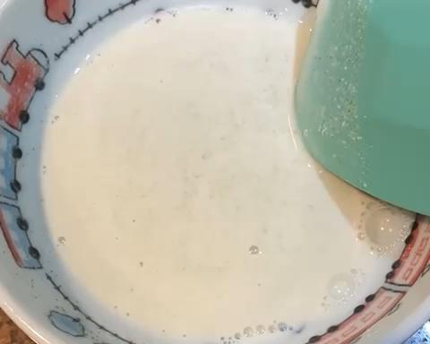 Whisk the mung bean flour, rice flour, all-purpose flour and water together until smooth. It should flow off the whisk like thin pancake batter — add a splash more water if it feels pasty.
