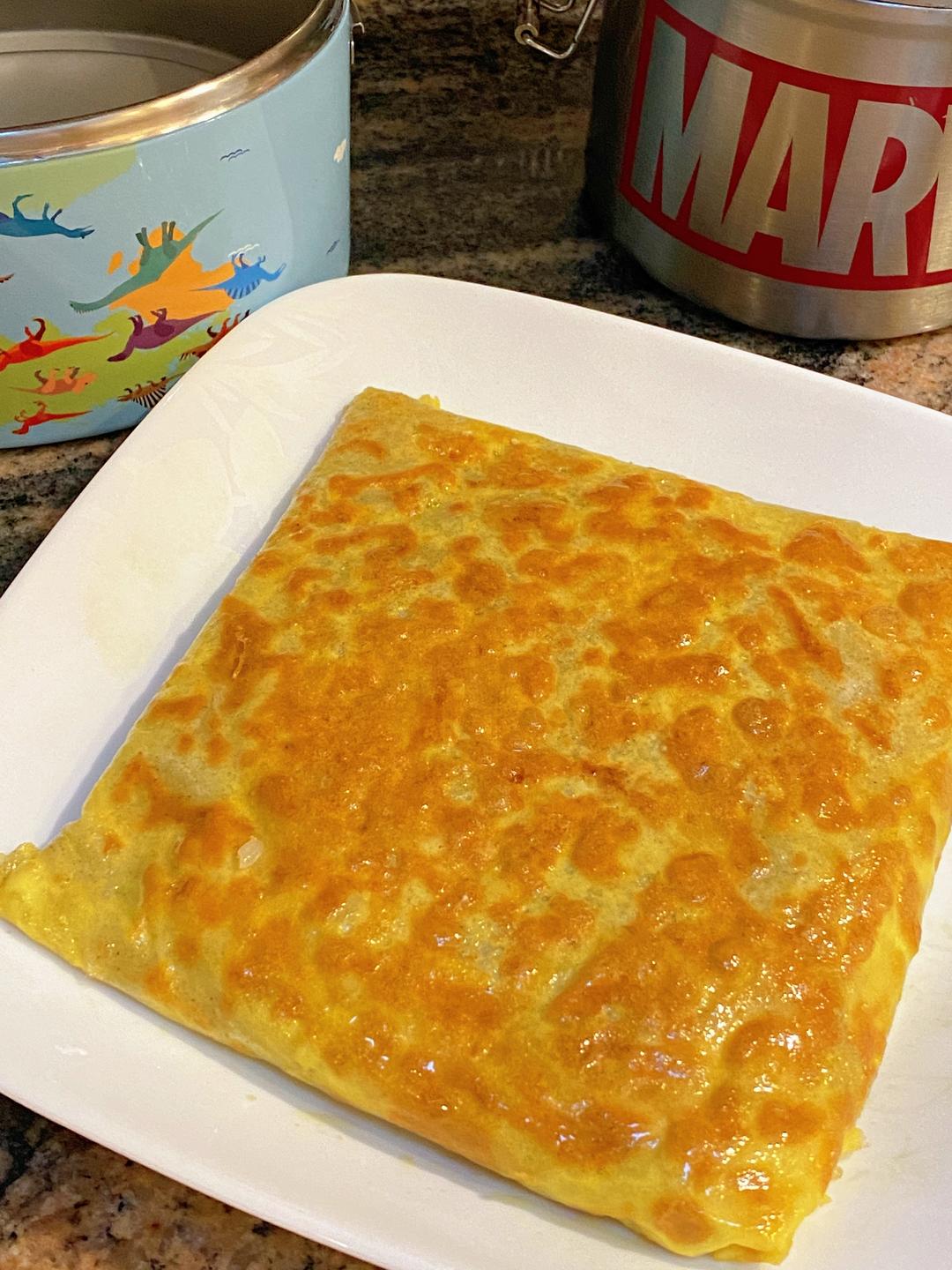 Cut the doupi into squares or diamonds and serve immediately, golden and steaming. This is very much a “eat it now” breakfast.