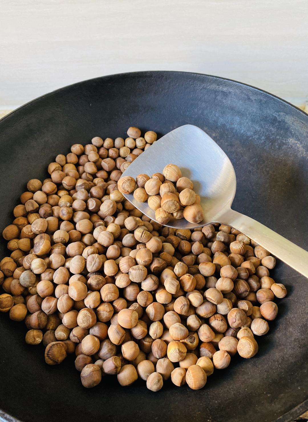 Crack one nut and taste to confirm it is done