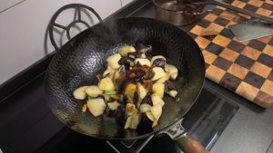 Reduce to the gloss and serve over rice