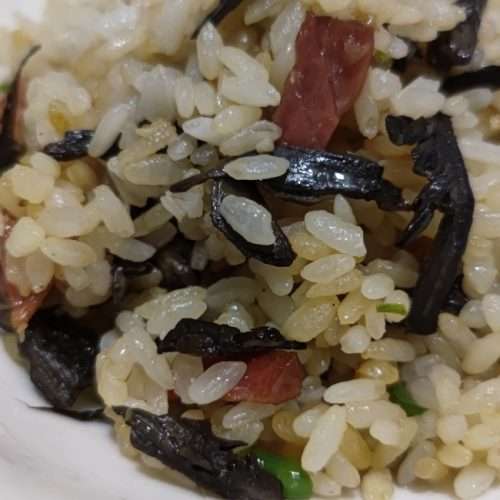 Yunnan ganba jun wild mushroom fried rice with Xuanwei ham, chilies and garlic