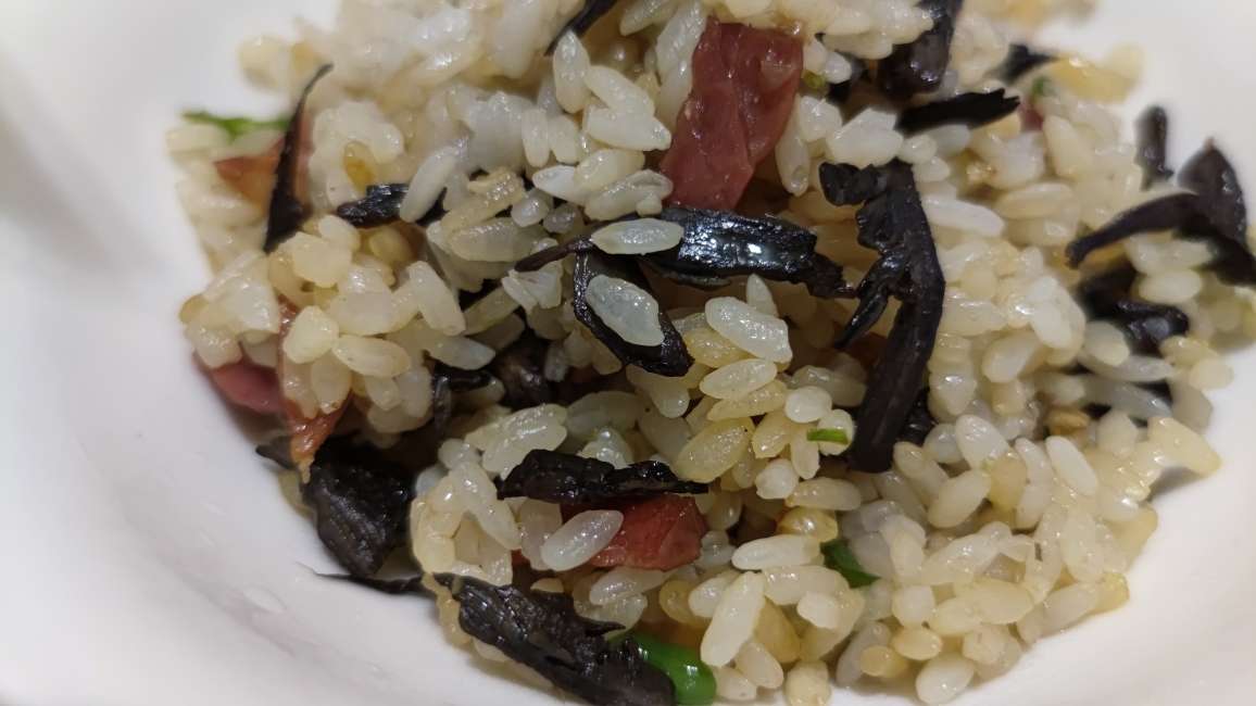Yunnan ganba jun wild mushroom fried rice with Xuanwei ham, chilies and garlic