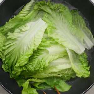 Blanch the lettuce in boiling water for thirty seconds until just tender