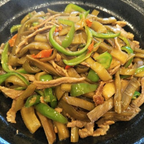 Gong cai pork stir-fry with crisp green stems