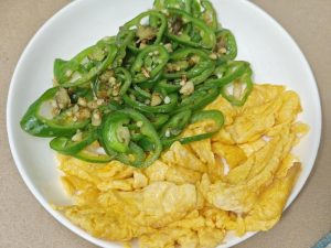 Set the peppers aside with the egg