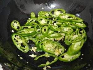 Add the pepper rings and stir-fry