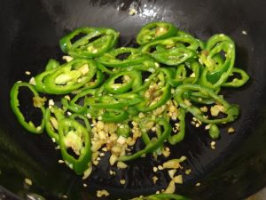 Cook the peppers until just done, still bright and crisp