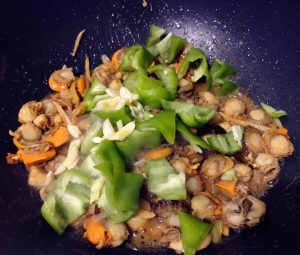 Add the wine, soy, oyster sauce, and salt