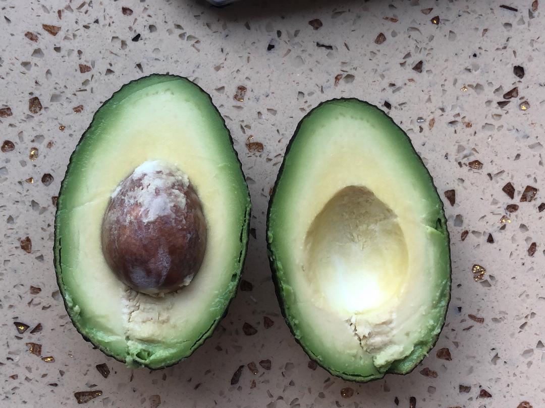 Peel and pit the avocado; slice thinly