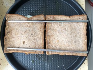 Cut the pressed sandwich and serve