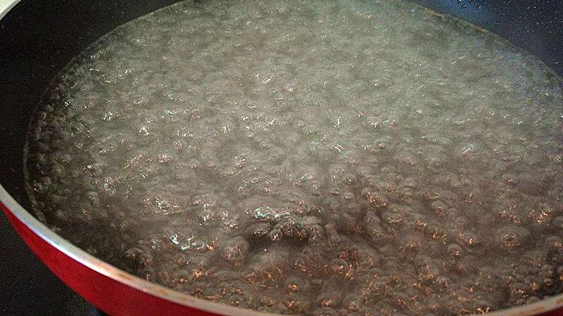 Bring a small pot of water to a rolling boil for blanching the greens.