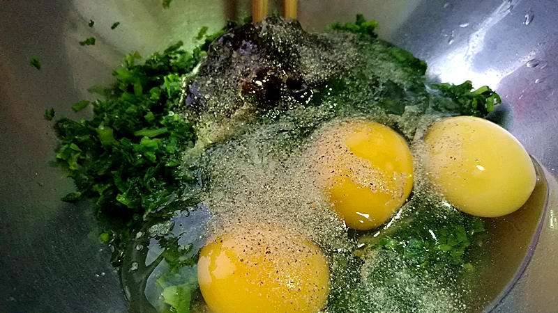 Mix the shrimp, chopped greens, eggs, oyster sauce, white pepper, salt and sugar in a bowl.