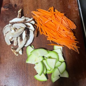 Arrange the beef and vegetables in sections