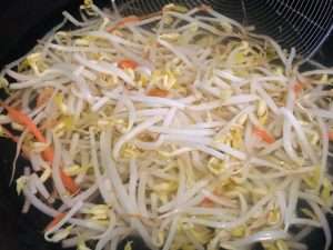 Blanch the bean sprouts briefly until just tender but still crisp