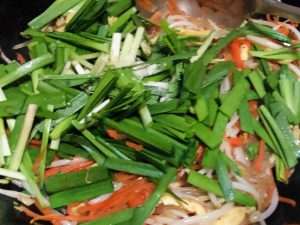 Add the chives and seasoning, toss briefly, and serve immediately