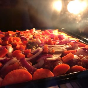 Second roast for fifteen minutes while the fat sizzles onto the vegetables