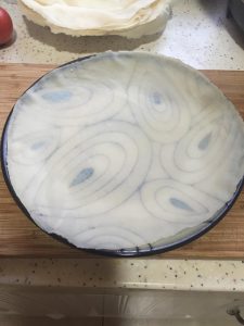 The plate pattern is clearly visible through the thin pancake