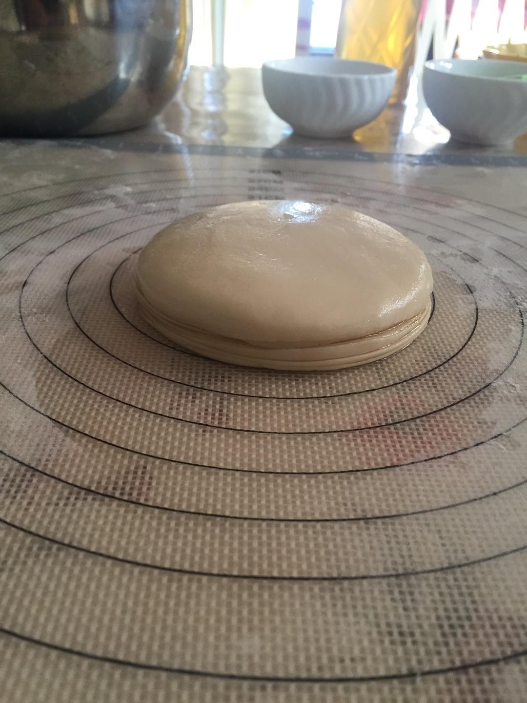 Press the stack by hand before the final roll