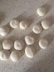 Divide the dough into seventeen equal balls