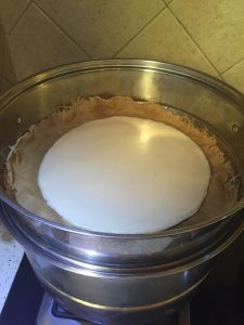 Steam the rolled pancake stack for fifteen minutes after boiling