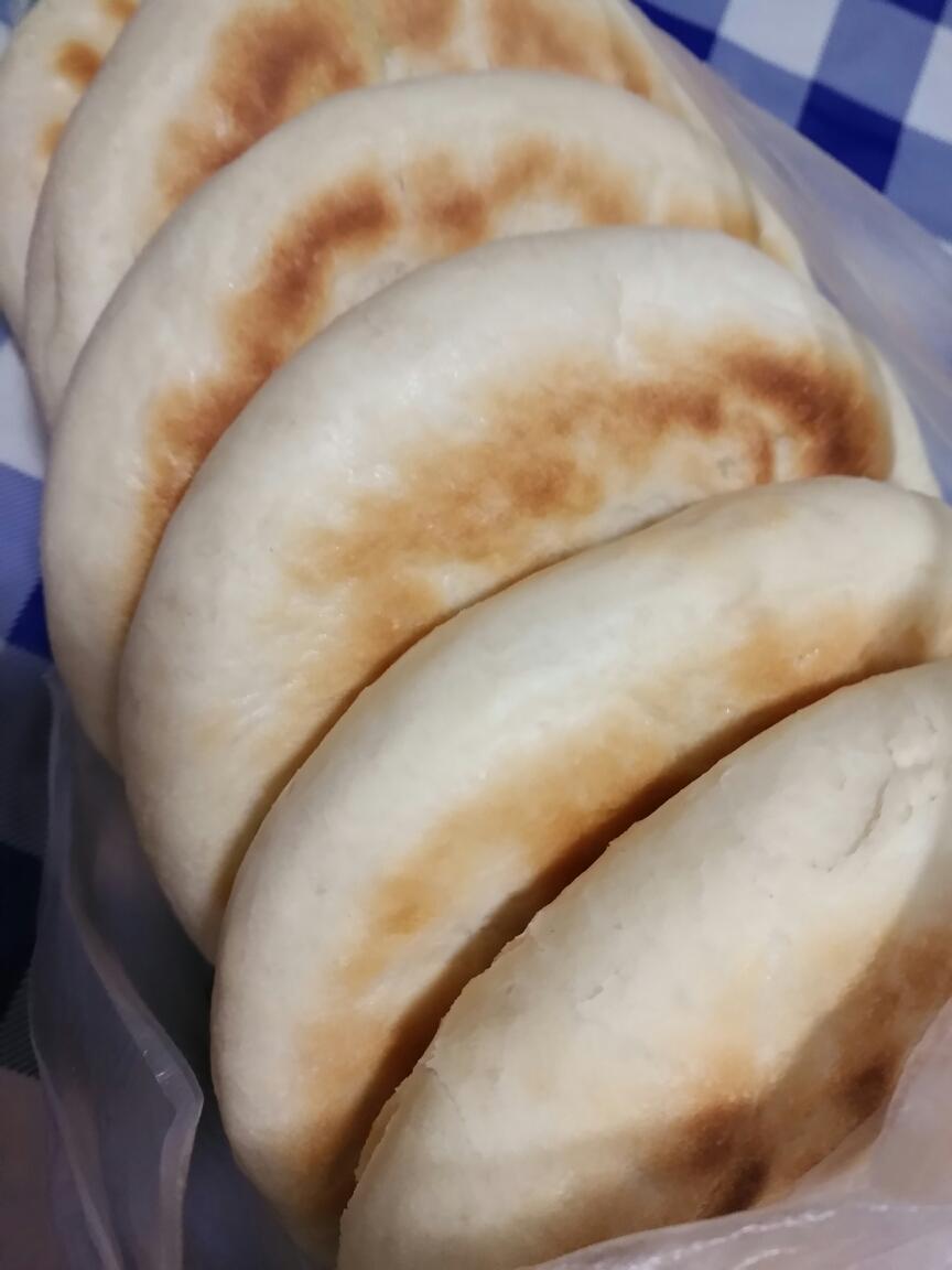 Golden pocket bread with a hollow center for stuffing