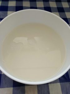 Dissolve the yeast and sugar in warm water and rest five minutes