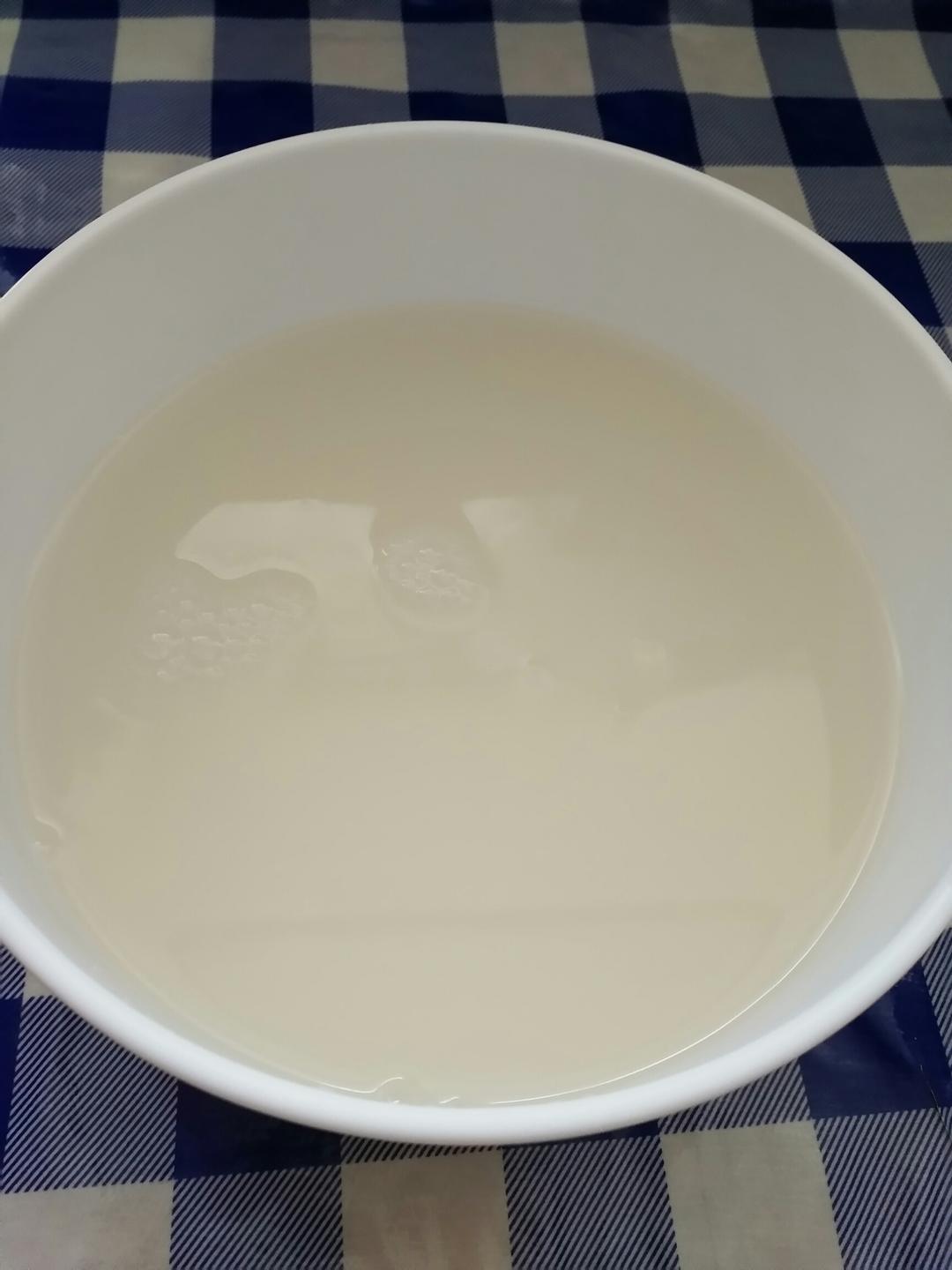 Dissolve the yeast and sugar in warm water and rest five minutes