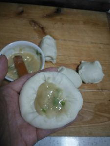 Seal the dough closed around the paste