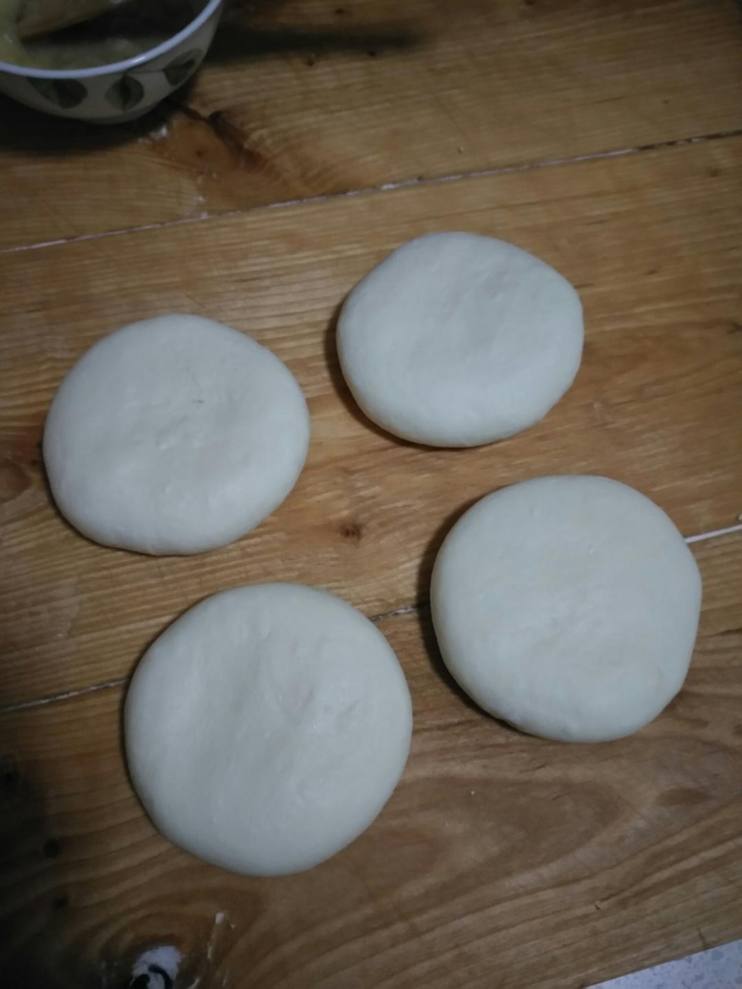 Press the dough flat with the palm