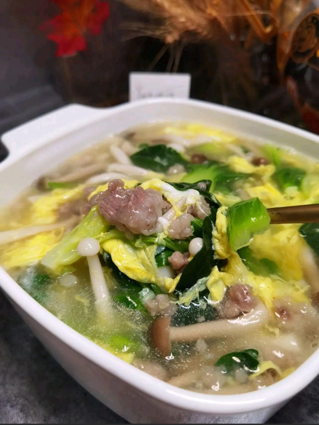 Mom's poached pork soup (cuan rou tang) - silky starchy-coated pork with mushrooms, greens and egg ribbons in a clear broth