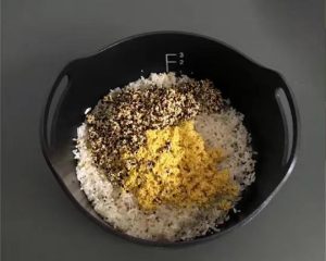 Drain the quinoa and millet and add them to the rice cooker with the white rice.