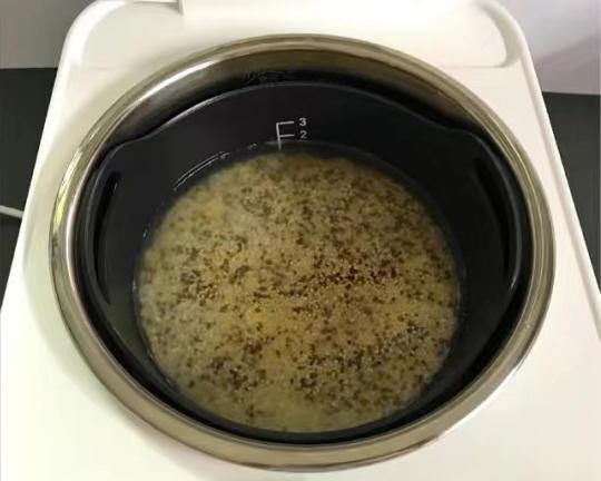 Add water to one finger-joint above the grains, close the rice cooker lid and press cook.