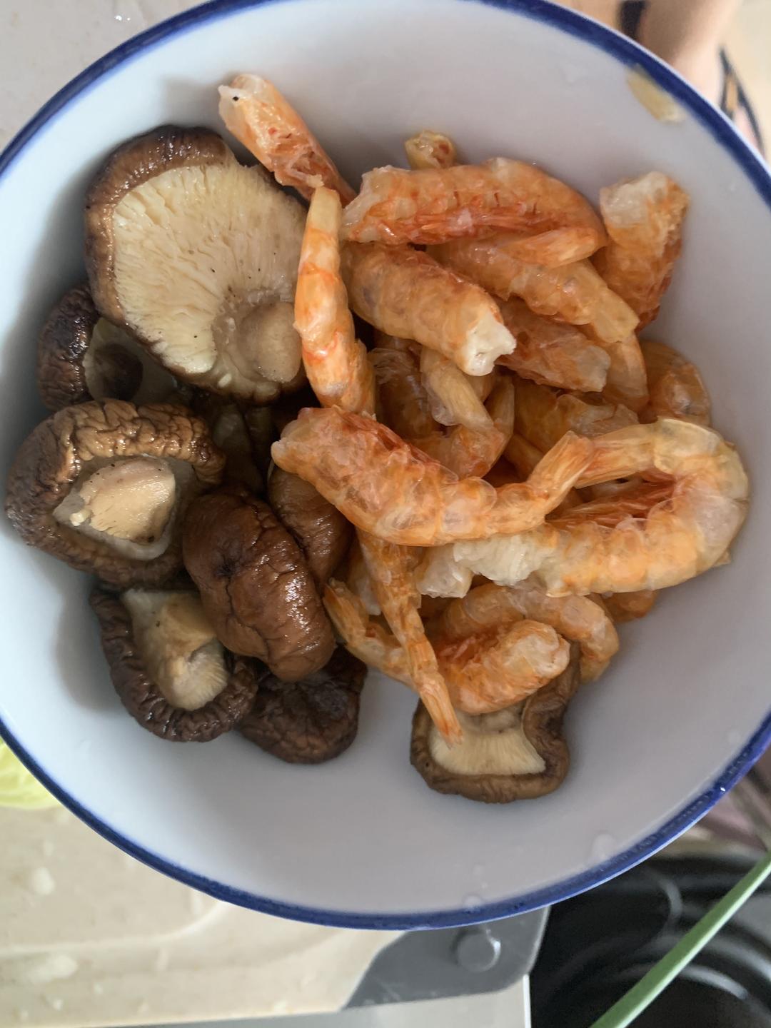 Rehydrating dried shiitake mushrooms in hot water