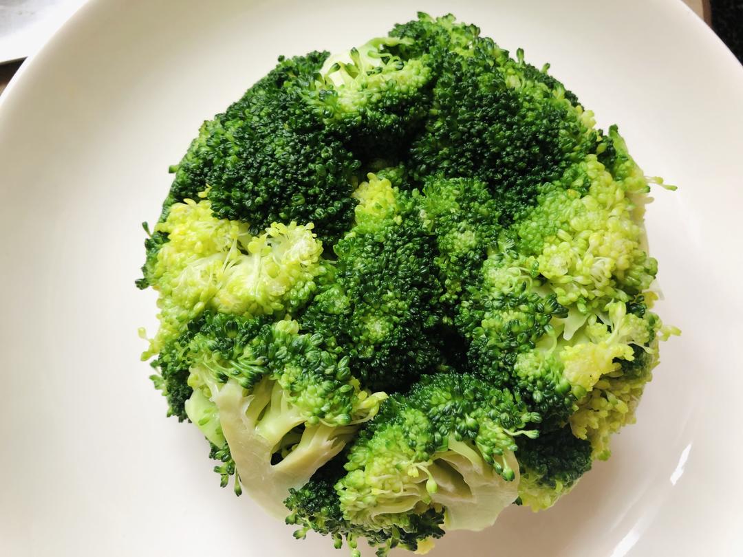 Inverting the broccoli dome onto a plate