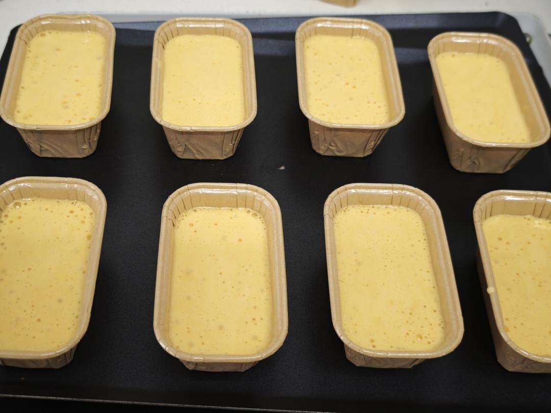 Transfer the batter to a piping bag and fill each mold to about 8-9 tenths full.