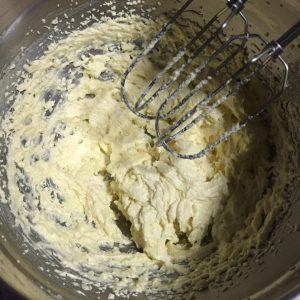 Add the egg in three parts, beating fully between each