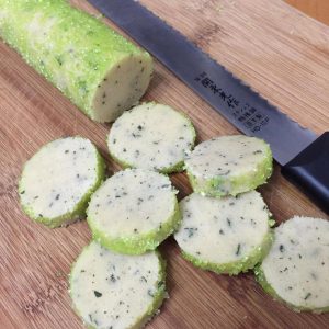 Roll the frozen log in coarse sugar and slice into even rounds