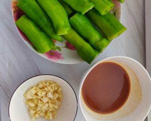 Prep the peppers, garlic, and soybean paste