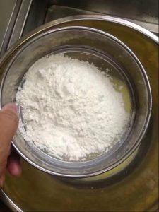 Emulsify the milk and oil, sift in the flour, and add the yolks in three additions