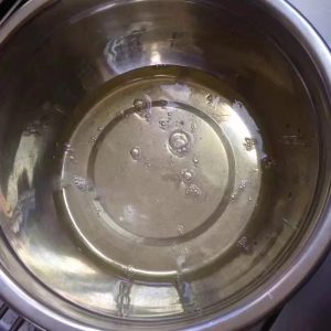 Whip the whites to fish eye bubbles and begin adding the sugar