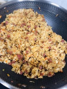 Spoon the filling onto the wrappers and gather the edges