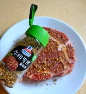 Rub the steak seasoning evenly over both sides of the steak