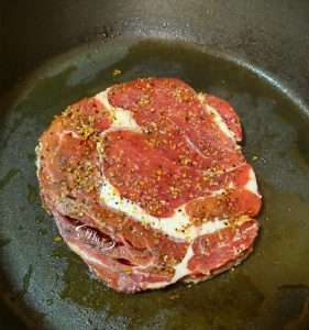 Sear the steak until deeply browned, rest, and slice into strips
