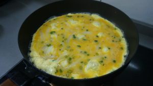Pan-fry the omelet over medium low heat for two minutes per side