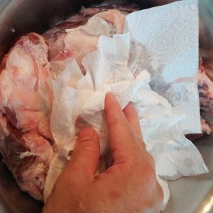 Pat the beef dry - the cured meat is vivid pink