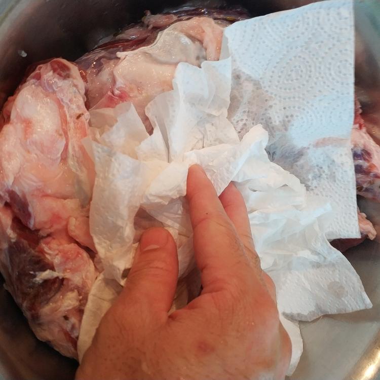 Pat the beef dry - the cured meat is vivid pink
